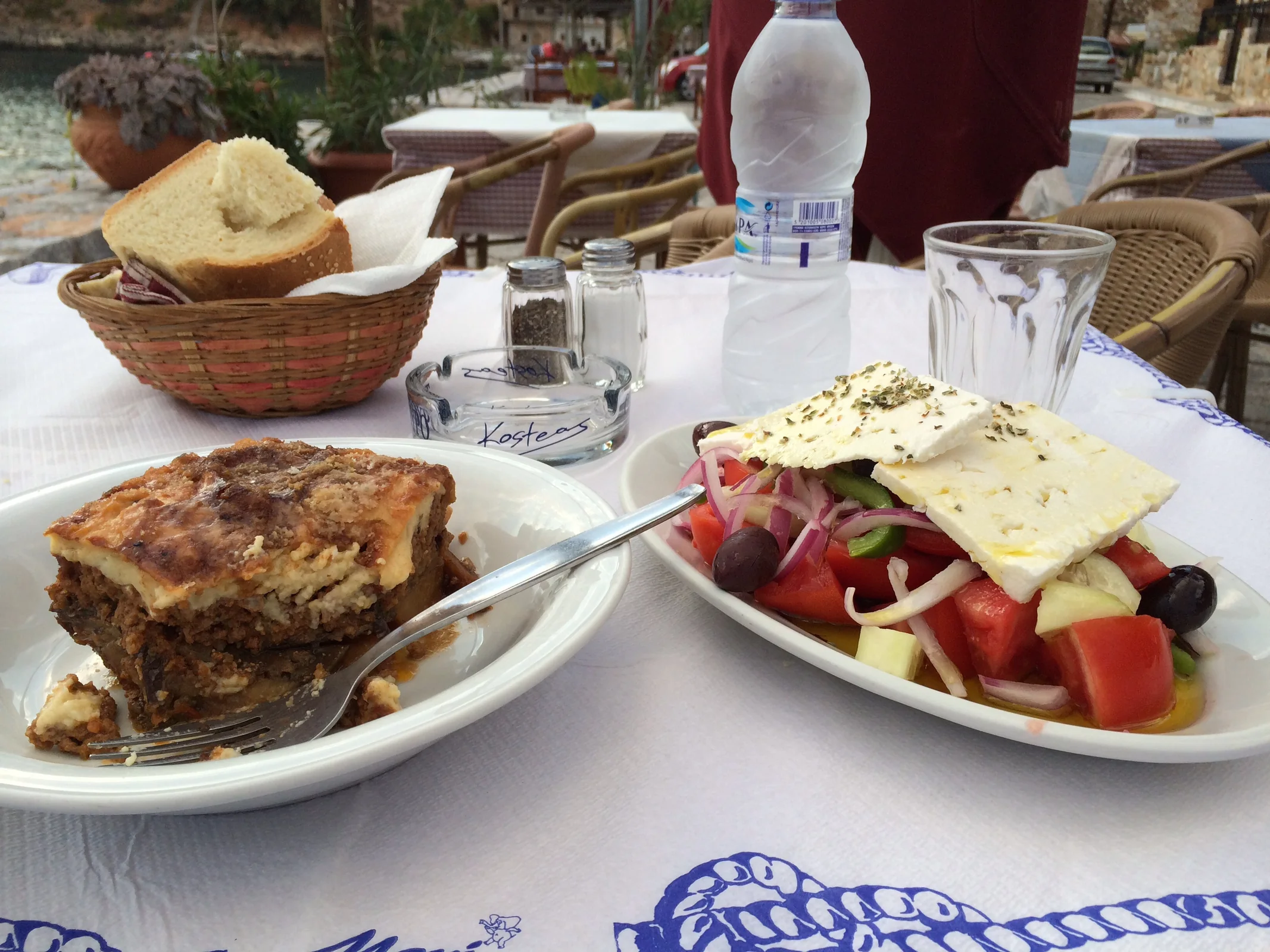 Moussaka and Greek salad served at a taverna in Greece.